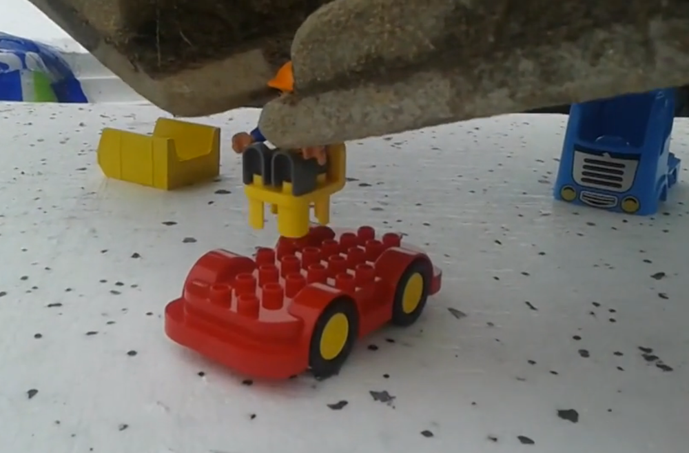 excavator builds lego dump truck