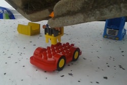 excavator builds lego dump truck