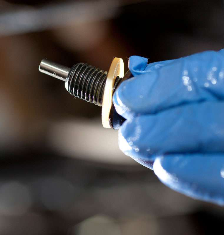 Inspect and clean the drain plug magnet as well as the magnet on the filter itself.