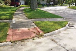 Older and newer: This older-style curb ramp contrasts with a late model in foreground