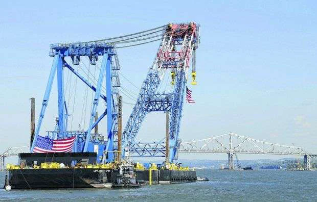Left Lifter “Left Coast Lifter,” one of the largest floating cranes in the world ...