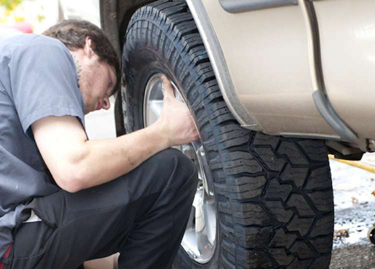 Changing a tire on a pickup truck