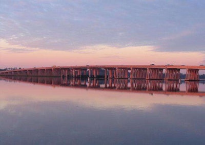 A construction worker is accused of throwing his co-worker from the Gen. William C. Westmoreland Bridge.