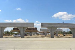 Completed columns and caps on this six-lane highway (three in each direction).