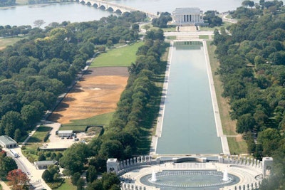 The face is drawn using rock, dirt and gravel precisely positioned using GPS data points.