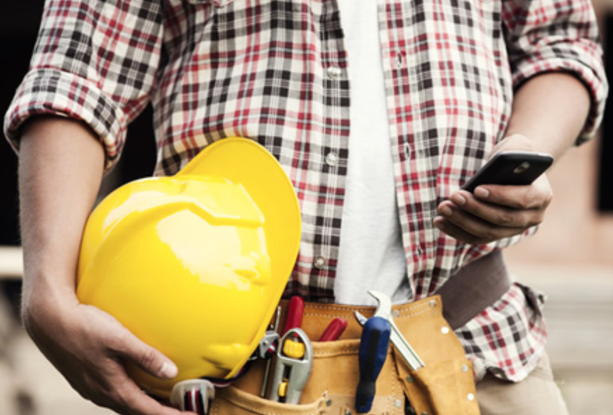 construction contractor worker using smartphone