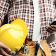 construction contractor worker using smartphone