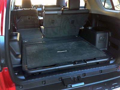 The 2nd row seats fold flat to provide a decent cargo area. The slide-out tray in the main cargo area can support 400 pounds.