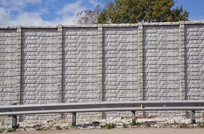 Precast panels permit aesthetic design; relief helps attenuate noise