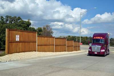 Wood sound walls provide attractive isolations for rest areas from interstates.