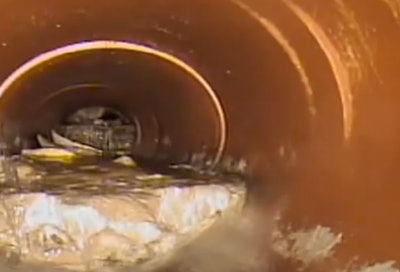 A look at the pile of concrete clogging the sewer pipe. Credit: KIRO TV