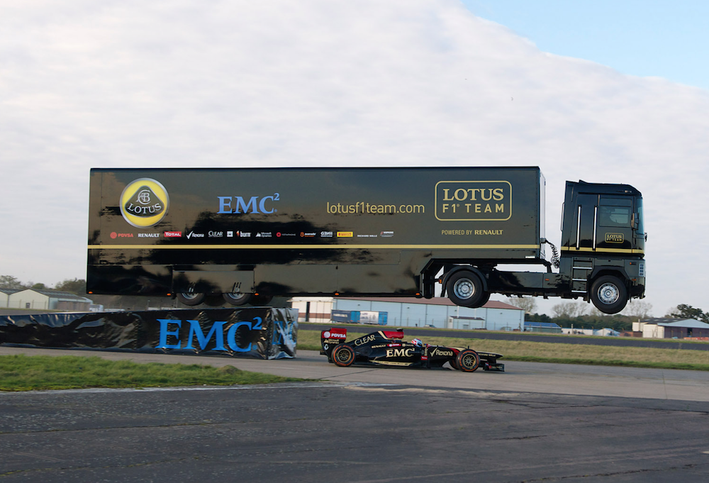 Semi truck jumps over F1 car