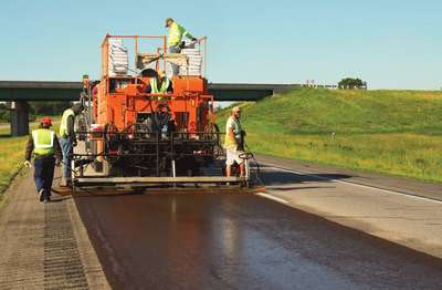 Micro Surfacing incorporating latex polymer modifier is placed on I-35 in Iowa