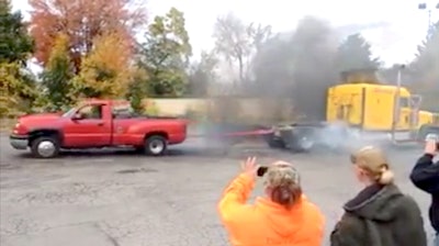 Chevy Silverado semi truck tug of war
