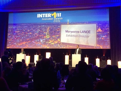 Intermat Exhibition Director Maryvonne Lanoe (left) addresses exhibitors and journalists prior to the announcement of the Innovation Award winners.