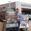 John, left, and Trey Jenkins take delivery of the 2014 Contractors Dream Package.