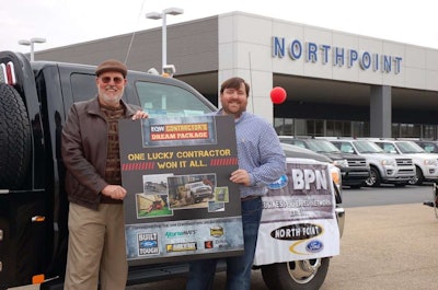 John, left, and Trey Jenkins take delivery of the 2014 Contractors Dream Package.