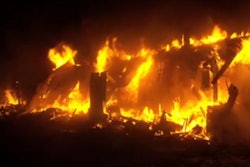 Residents of Paulina, Oregon fought back the flames of a fire that consumed three homes using a bulldozer and fire extinguishers. Credit: Still of a KTVZ video.