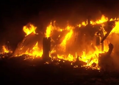 Residents of Paulina, Oregon fought back the flames of a fire that consumed three homes using a bulldozer and fire extinguishers. Credit: Still of a KTVZ video.