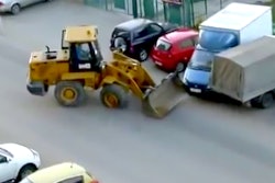 drunk man wheel loader parked cars