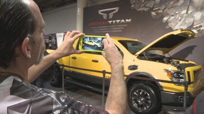 Titan XD poses for truck lovers who can’t wait for the Cummins-powered truck to hit the market later this fall. It’s a big hit with outdoorsmen.