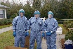 Hayden workers suited up for crime scene cleanup. Credit: Melonie Flomer/Daily Journal