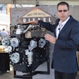 Jeff Wilke, product manager for diesel engines in North America, with the KDI 3404 at World of Concrete.