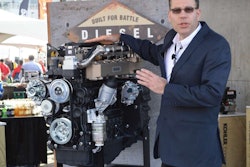 Jeff Wilke, product manager for diesel engines in North America, with the KDI 3404 at World of Concrete.