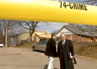 In this still from a WZTV report, police officials are seen near a Nashville jobsite where a shooting occurred.