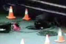 The moment before Roberts was run over by the truck’s rear tire, captured by surveillance video.