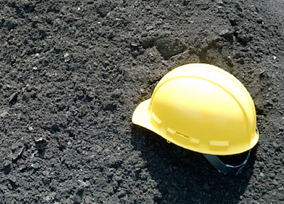 hard hat fallen in dirt