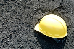 hard hat fallen in dirt