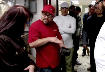 A class in one of ADOT’s pre-apprenticeship programs discusses asphalt.