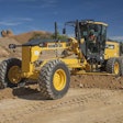 The Komatsu GD655-6 offers a dual-mode transmission and a 21-foot, 4-inch wheelbase.