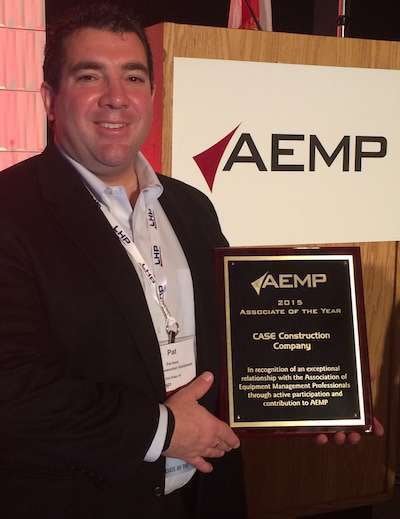 Pat Hunt, Case Construction Equipment’s Director of Strategic Accounts, accepts the Associate of the Year award.