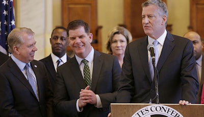 New York City mayor Bill de Blasio addresses the media at the USCM’s Cities of Opportunities Task Force in Boston. Credit: Associated Press
