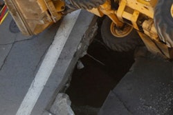 backhoe in hole