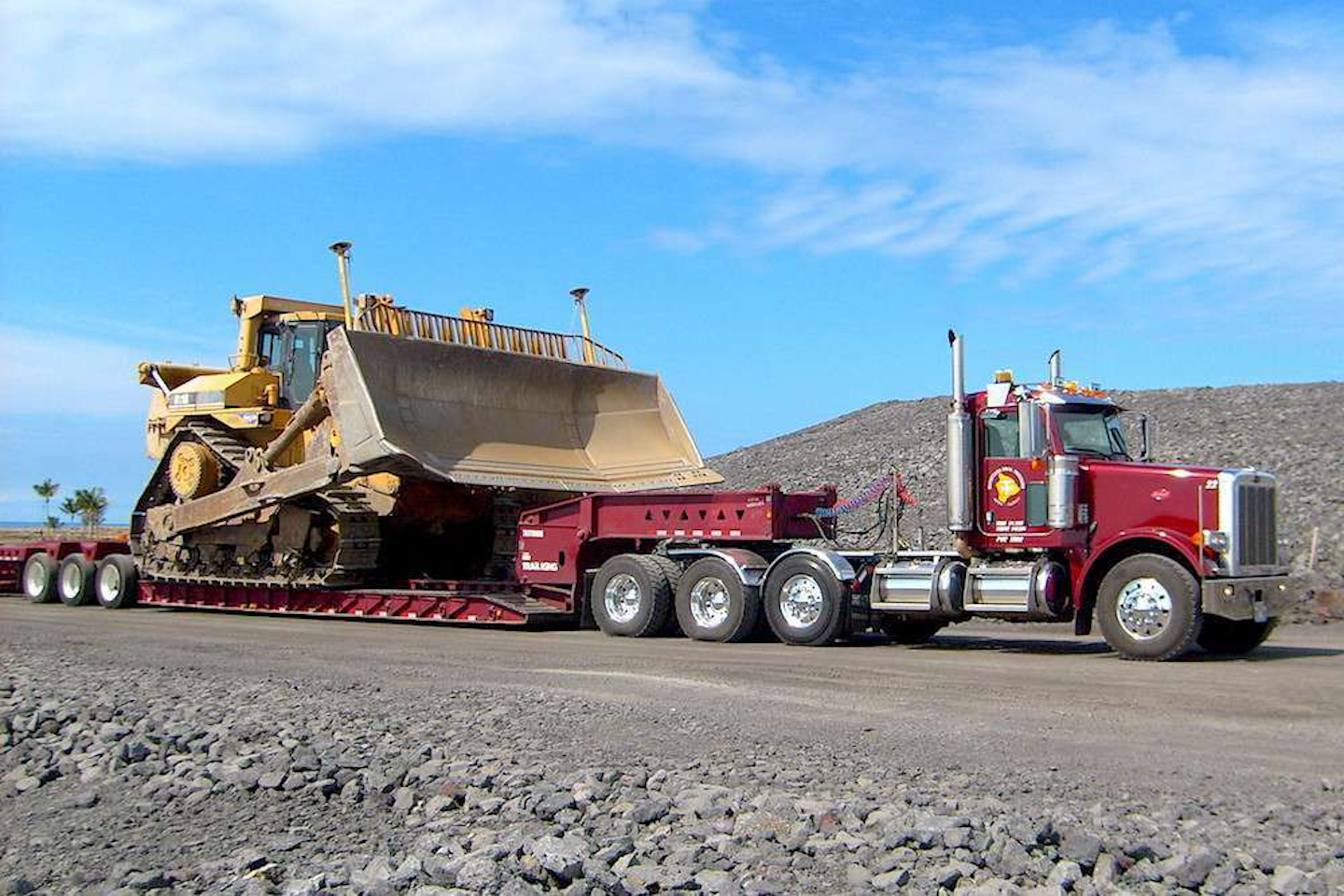 How to determine trailer length for heavy equipment hauling using ...