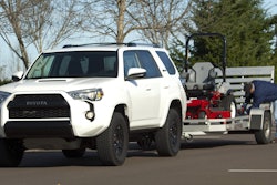 2105 4Runner TRD Pro can tow 4,700 pounds, making easy work toting this eXmark Lazer Series zero-turn mower to a job.