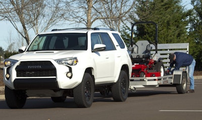 2105 4Runner TRD Pro can tow 4,700 pounds, making easy work toting this eXmark Lazer Series zero-turn mower to a job.