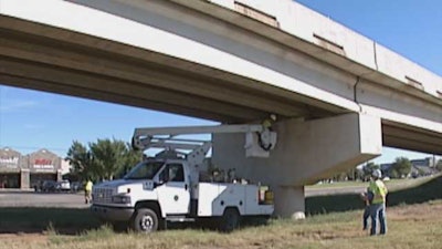 Oklahoma DOT workers inspect a bridge after an earthquake in this still from News On 6 footage.
