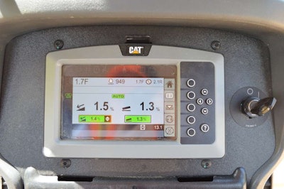 The in-cab monitor shows the main-fall angle percentages (left) and the blade cross slope (right). To change these you use the buttons on the right.
