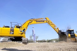 Komatsu machines prepare a space among Intermat’s 323,000 square feet of demo space.