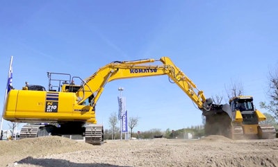 Komatsu machines prepare a space among Intermat’s 323,000 square feet of demo space.