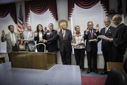 New members of the N.C. Board of Transportation are, left to right, Andrew Perkins, Patrick Molamphy, Tracy Dodson, Walter Debnam Jr., Hugh Overholt, Sandra Fountain, Terry Hutchens and Gus Tulloss. North Carolina State Supreme Court Justice Paul Newby, far right, conducted the swearing in ceremony.