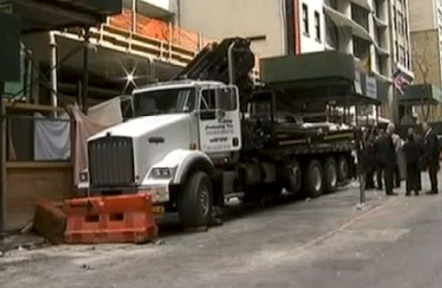 The failed truck crane that killed a worker in Manhattan on Friday is seen in a still from footage shot by NBC New York.