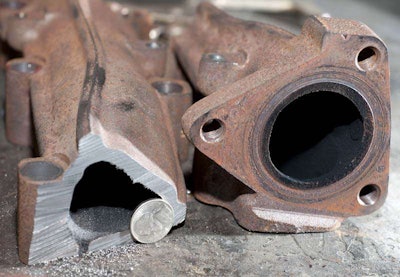 One section of the OEM manifold on this 2008 Duramax 6.6L is constricted to allow clearance for the steering shaft. So instead of a nice round exhaust passage it creates a choke point that reduces overall exhaust flow by about 20 percent.