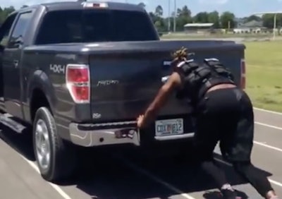 Alabama Football Derrick Henry pushing F-150 Roll Tide