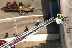 A still from WJLA footage shows the concrete finishers that were being used inside the warehouse.