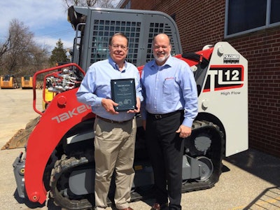 Folcomer Equipment presented with Top Volume Dealer of the Year.